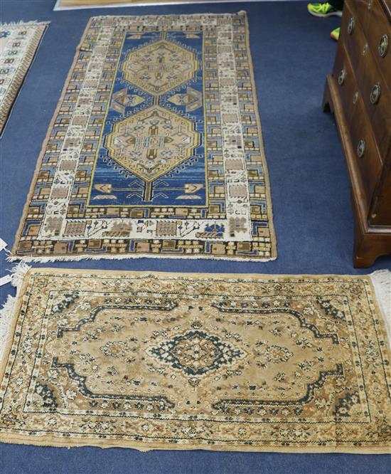 A blue ground rug and another 195 x 97cm, 120 x 62cm